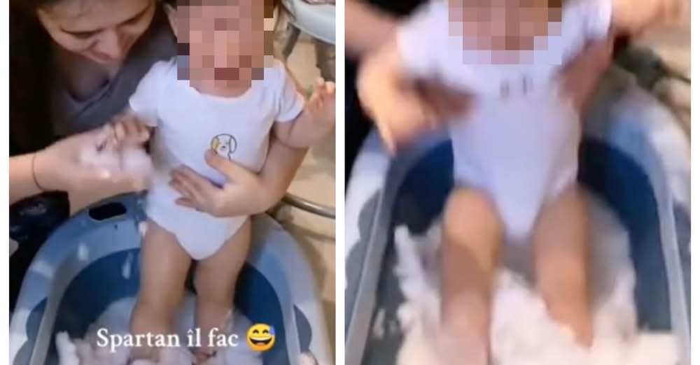 Bagna il bambino nella neve per rafforzarlo e condivide il video, la pediatra: “Un atto insensato”